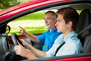 Instructor guiding a learner driver